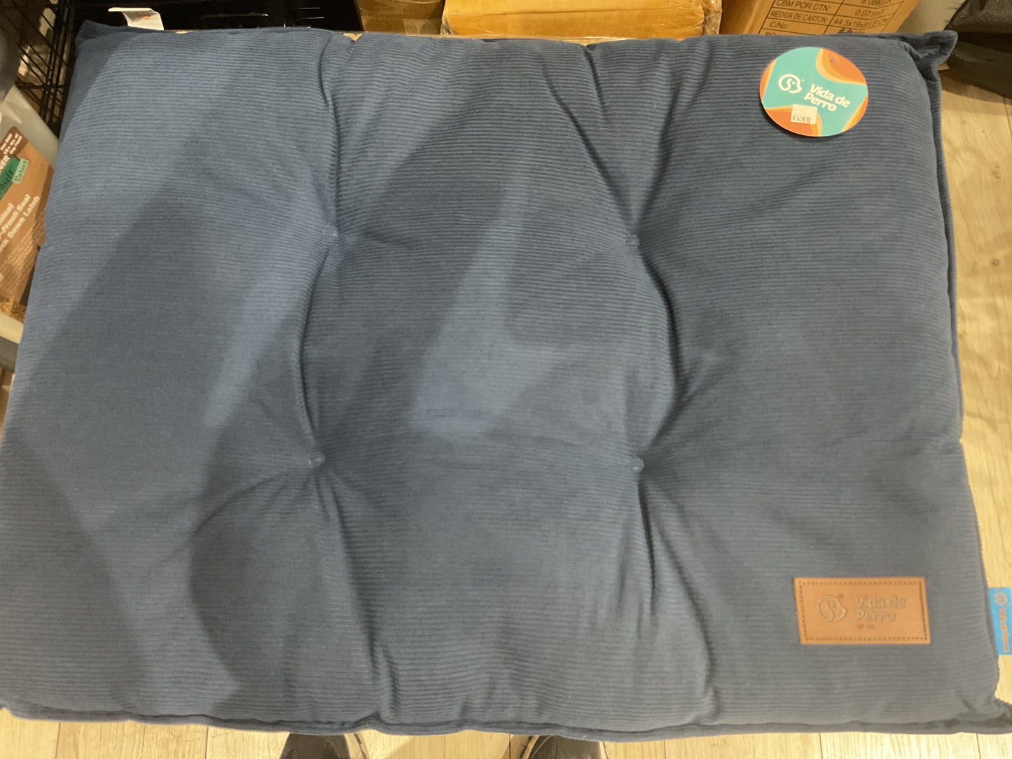 Cama azul para perros tipo almohada tamaño S