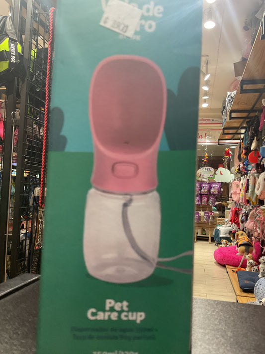 Botella dispensador de agua, comida, bolsa y pala